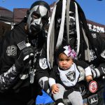 Fans pose for a photo prior to the NFL game between the Oakland Raiders and the Denver Broncos at RingCentral Coliseum on September 09, 2019 in Oakland, California. (Photo by Robert Reiners/Getty Images)