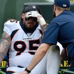 GREEN BAY, WISCONSIN - SEPTEMBER 22: Derek Wolfe #95 of the Denver Broncos leaves the field after being injured in the second quarter against the Green Bay Packers at Lambeau Field on September 22, 2019 in Green Bay, Wisconsin. (Photo by Quinn Harris/Getty Images)