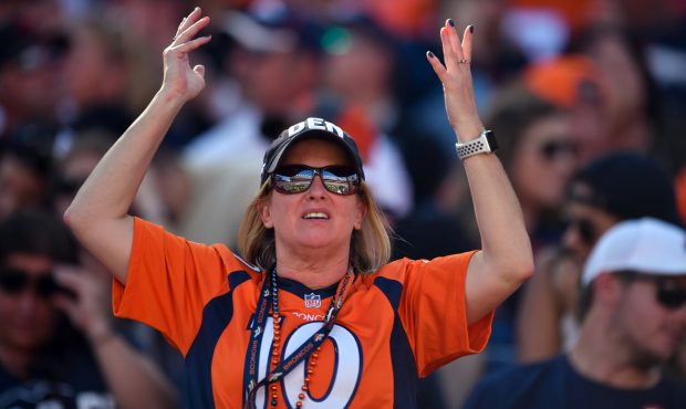 DENVER, CO - SEPTEMBER 29: A fan reacts between plays during the second quarter of the game on Sund...