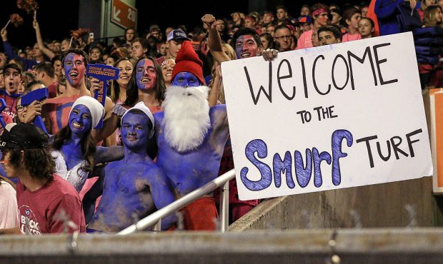 Boise State fans welcome everyone to the "Smurf Turf" during first half action between the Utah Sta...