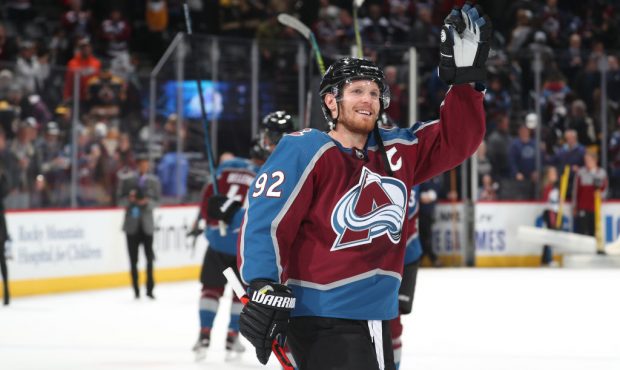 Gabriel Landeskog #92 of the Colorado Avalanche waves to the crowd after a win against the Boston B...
