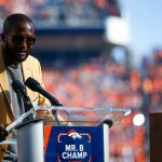 DENVER, CO - OCTOBER 13:  Former Denver Broncos cornerback Champ Bailey addresses the crowd after being presented with his Hall of Fame ring and being inducted into the Denver Broncos Ring of Fame during halftime against the Tennessee Titans at Empower Field at Mile High on October 13, 2019 in Denver, Colorado. (Photo by Justin Edmonds/Getty Images)