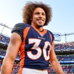 DENVER, CO - OCTOBER 13:  Phillip Lindsay #30 of the Denver Broncos smiles as he walks on the field after the Denver Broncos 16-0 win over the Tennessee Titans at Empower Field at Mile High on October 13, 2019 in Denver, Colorado. (Photo by Dustin Bradford/Getty Images)