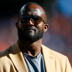 DENVER, CO - OCTOBER 13:  Former cornerback for the Denver Broncos Champ Bailey stands on the field during a ceremony to present him with his ring for the Pro Football Hall of Fame during halftime against the Tennessee Titans at Empower Field at Mile High on October 13, 2019 in Denver, Colorado. (Photo by Justin Edmonds/Getty Images)