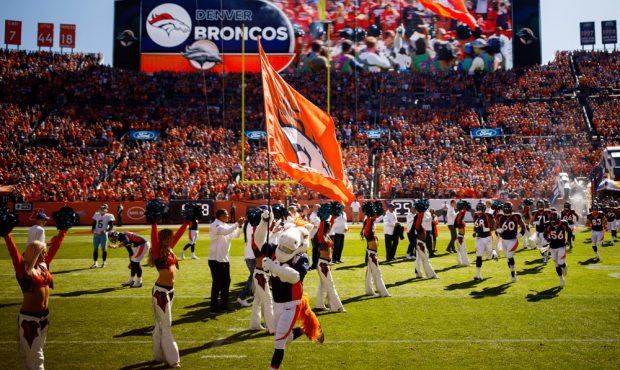 DENVER, CO - OCTOBER 13: The Denver Broncos take the field before a game against the Tennessee Tita...