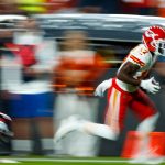DENVER, CO - OCTOBER 17:  Wide receiver Mecole Hardman #17 of the Kansas City Chiefs runs with the football for a touchdown after eluding cornerback Kareem Jackson #22 of the Denver Broncos during the first quarter at Empower Field at Mile High on October 17, 2019 in Denver, Colorado. (Photo by Justin Edmonds/Getty Images)