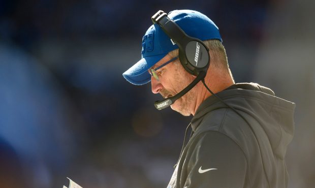 INDIANAPOLIS, IN - OCTOBER 27: Head coach Frank Reich looks at the playbook during the first quarte...