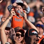 DENVER, CO - OCTOBER 13: A young Broncos fan cheers on the team during the fourth quarter of the game on Sunday, October 13, 2019 at Empower Field at Mile High. The Denver Broncos hosted the Tennessee Titans for the game. (Photo by Eric Lutzens/The Denver Post)
