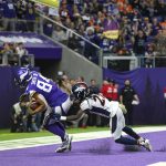 MINNEAPOLIS, MN - NOVEMBER 17: Irv Smith #84 of the Minnesota Vikings catches the ball for a touchdown over defender Davontae Harris #27 of the Denver Broncos in the third quarter of the game at U.S. Bank Stadium on November 17, 2019 in Minneapolis, Minnesota. (Photo by Stephen Maturen/Getty Images)