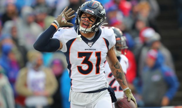 ORCHARD PARK, NY - NOVEMBER 24: Justin Simmons #31 of the Denver Broncos celebrates his interceptio...