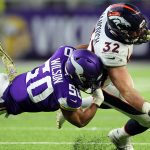 MINNEAPOLIS, MINNESOTA - NOVEMBER 17:  Andy Janovich #32 of the Denver Broncos runs the ball against Eric Wilson #50 of the Minnesota Vikings in the second quarter at U.S. Bank Stadium on November 17, 2019 in Minneapolis, Minnesota. (Photo by Adam Bettcher/Getty Images)