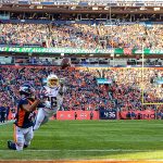 DENVER, CO - DECEMBER 1:  Courtland Sutton #14 of the Denver Broncos catches a first quarter touchdown reception under coverage by Casey Hayward Jr. #26 of the Los Angeles Chargers during a game at Empower Field at Mile High on December 1, 2019 in Denver, Colorado.  (Photo by Dustin Bradford/Getty Images)