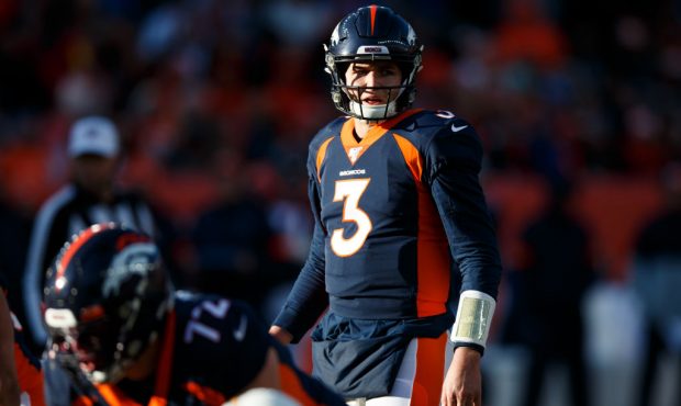 DENVER, CO - DECEMBER 1:  Quarterback Drew Lock #3 of the Denver Broncos surveys the defense during...