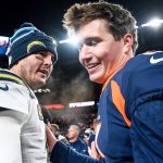 DENVER, CO - DECEMBER 1:  Drew Lock #3 of the Denver Broncos and Philip Rivers #17 of the Los Angeles Chargers meet on the field after the Denver Broncos 23-20 win at Empower Field at Mile High on December 1, 2019 in Denver, Colorado.  (Photo by Dustin Bradford/Getty Images)