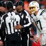 DENVER, CO - DECEMBER 1:  Quarterback Philip Rivers #17 of the Los Angeles Chargers listens in as the referees discuss a false start penalty on the Chargers in the fourth quarter against the Denver Broncos at Empower Field at Mile High on December 1, 2019 in Denver, Colorado. The Broncos defeated the Chargers 23-20. (Photo by Justin Edmonds/Getty Images)