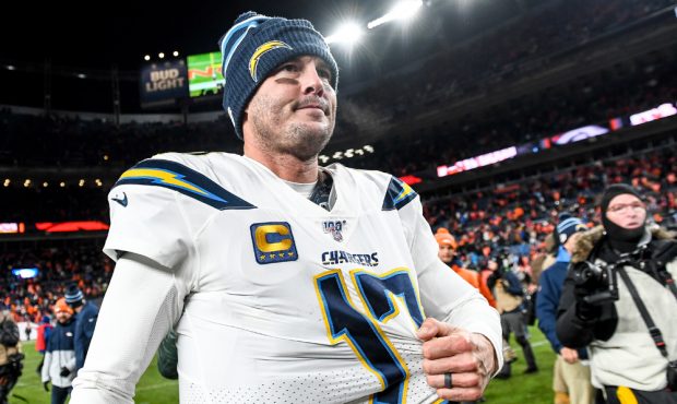 DENVER, CO - DECEMBER 1: Philip Rivers #17 of the Los Angeles Chargers reacts as he walks off the f...