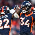 DENVER, CO - DECEMBER 1:  Kareem Jackson #22 and Will Parks #34 of the Denver Broncos celebrate after a fourth quarter defensive stop against the Los Angeles Chargers at Empower Field at Mile High on December 1, 2019 in Denver, Colorado.  (Photo by Dustin Bradford/Getty Images)