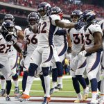 HOUSTON, TX - DECEMBER 08:  Kareem Jackson #22 of the Denver Broncos celebrates with temmates after an interception in the fourth quarter against the Houston Texans at NRG Stadium on December 8, 2019 in Houston, Texas.  (Photo by Tim Warner/Getty Images)