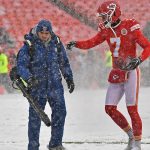 KANSAS CITY, MO - DECEMBER 15:  Kicker Harrison Butker #7 of the Kansas City Chiefs points out an area to clear to a member of the field crew before a game against the Denver Broncos at Arrowhead Stadium on December 15, 2019 in Kansas City, Missouri. (Photo by Peter Aiken/Getty Images)