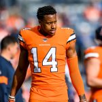 DENVER, CO - DECEMBER 22:  Courtland Sutton #14 of the Denver Broncos stands on the field as he warms up before a game against the Detroit Lions at Empower Field at Mile High on December 22, 2019 in Denver, Colorado.  (Photo by Dustin Bradford/Getty Images)