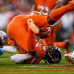 DENVER, CO - DECEMBER 22:  Royce Freeman #28 of the Denver Broncos falls into the end zone for a second quarter touchdown against the Detroit Lions at Empower Field on December 22, 2019 in Denver, Colorado. (Photo by Dustin Bradford/Getty Images)