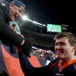 DENVER, COLORADO - DECEMBER 01: Quarterback Drew Lock #3 of the Denver Broncos is congratulated by his father, Andy Lock, after their win against the Los Angeles Chargers at Empower Field at Mile High on December 01, 2019 in Denver, Colorado. (Photo by Matthew Stockman/Getty Images)