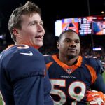 DENVER, COLORADO - DECEMBER 01: Quarterback Drew Lock #3 of the Denver Broncos celebrates with Malik Reed #58 as he leaves the field after their win against the Los Angeles Chargers at Empower Field at Mile High on December 01, 2019 in Denver, Colorado. (Photo by Matthew Stockman/Getty Images)