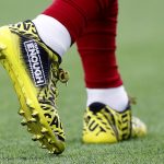 HOUSTON, TEXAS - DECEMBER 08:  Lonnie Johnson #32 of the Houston Texans wears special cleats for warm ups before the game against the Denver Broncos at NRG Stadium on December 08, 2019 in Houston, Texas. (Photo by Tim Warner/Getty Images)