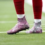 HOUSTON, TEXAS - DECEMBER 08:  Charles Omenihu #94 of the Houston Texans wears special cleats during warm ups before the game against the Denver Broncos at NRG Stadium on December 08, 2019 in Houston, Texas. (Photo by Tim Warner/Getty Images)
