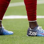 HOUSTON, TEXAS - DECEMBER 08:  DeAndre Carter #14 of the Houston Texans wears special cleats during warm ups before the game against the Denver Broncos at NRG Stadium on December 08, 2019 in Houston, Texas. (Photo by Tim Warner/Getty Images)