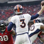 HOUSTON, TEXAS - DECEMBER 08:  D.J. Reader #98 of the Houston Texans closes in on Drew Lock #3 of the Denver Broncos in the first quarter at NRG Stadium on December 08, 2019 in Houston, Texas. (Photo by Tim Warner/Getty Images)