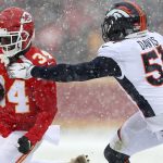 KANSAS CITY, MISSOURI - DECEMBER 15:  Running back Darwin Thompson #34 of the Kansas City Chiefs carries the ball as inside linebacker Todd Davis #51 of the Denver Broncos defends during the game at Arrowhead Stadium on December 15, 2019 in Kansas City, Missouri. (Photo by Jamie Squire/Getty Images)