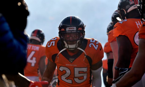 DENVER, CO - DECEMBER 29: Denver Broncos cornerback Chris Harris Jr. (25) runs on to the field prio...