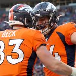 DENVER, COLORADO - DECEMBER 29: Andrew Beck #83 of the Denver Broncos celebrates with Troy Fumagalli #84 after scoring a touchdown against the Oakland Raiders in the second quarter at Empower Field at Mile High on December 29, 2019 in Denver, Colorado. (Photo by Matthew Stockman/Getty Images)