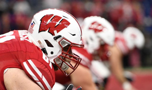 INDIANAPOLIS, IN - DECEMBER 07: Wisconsin Badgers offensive lineman Tyler Biadasz (61) warms up for...
