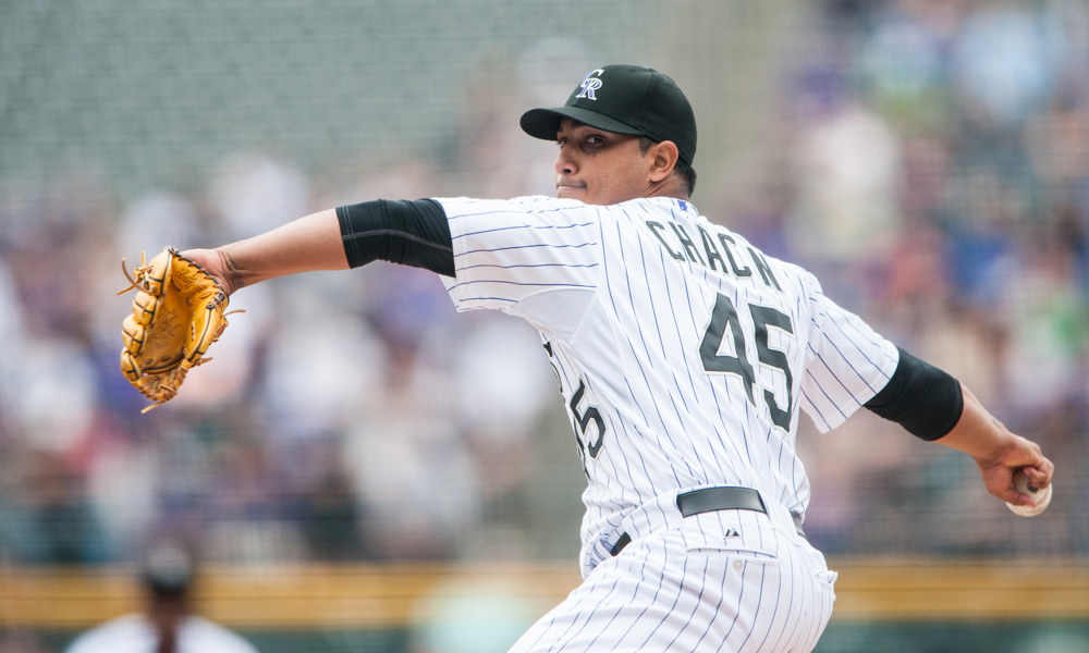 DENVER, CO - APRIL 7: Jhoulys Chacin #45 of the Colorado Rockies pitches against the San Diego Padres in the first inning of a game at Coors Field on April 7, 2013 in Denver, Colorado. (Photo by Dustin Bradford/Getty Images)