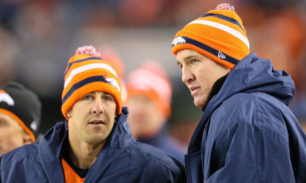 Denver Broncos quarterback Peyton Manning (18) with wide receiver Brandon Stokley (14). The Denver ...