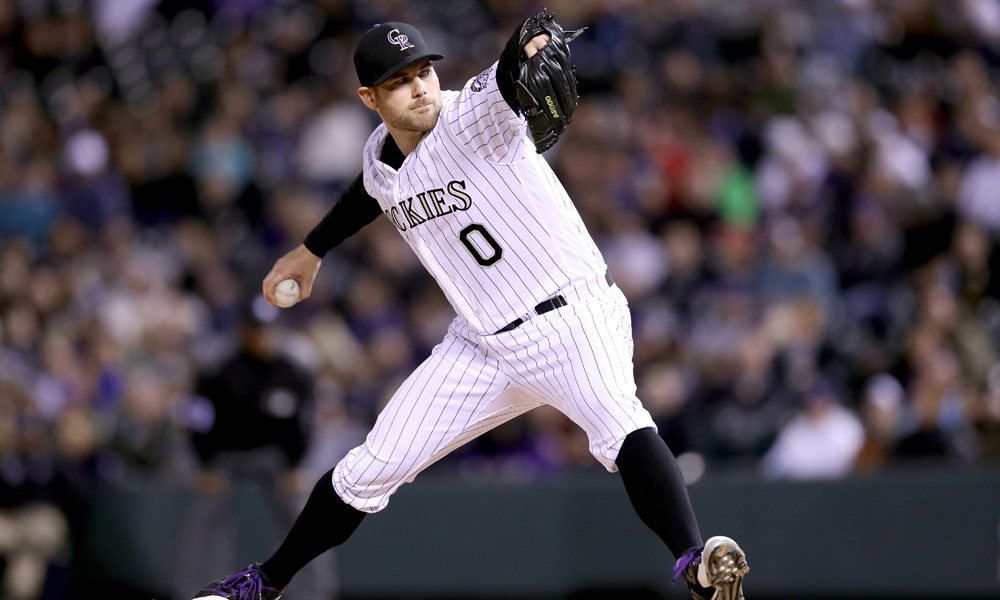 DENVER, CO - APRIL 11: Pitcher Adam Ottavino #0 of the Colorado Rockies throws against the San Diego Padres at Coors Field on April 11, 2017 in Denver, Colorado. (Photo by Matthew Stockman/Getty Images)