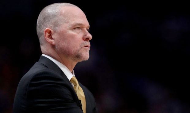 Head coach Michael Malone of the Denver Nuggets watches as his team plays the San Antonio Spurs in ...