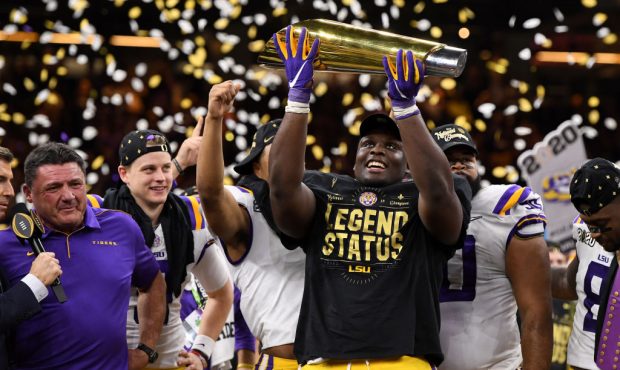 NEW ORLEANS, LA - JANUARY 13: Lloyd Cushenberry III #79 of the LSU Tigers celebrates after defeatin...
