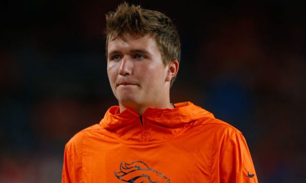 Quarterback Drew Lock #3 of the Denver Broncos looks on against the Arizona Cardinals during the th...