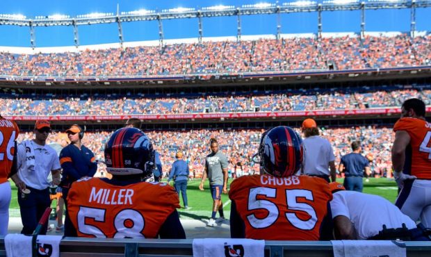 DENVER, CO - SEPTEMBER 29: Von Miller #58 and Bradley Chubb #55 of the Denver Broncos sit on the be...