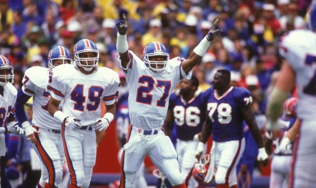 Steve Atwater #27 of the Denver Broncos celebrates a touchdown during a NFL football game against t...