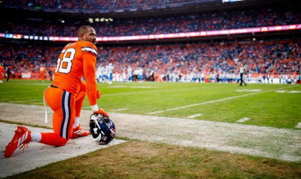 Linebacker Von Miller #58 of the Denver Broncos kneels on the sidelines against the Detroit Lions d...