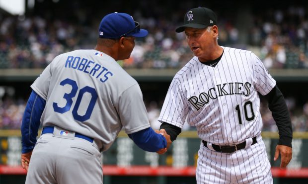 DENVER, CO - APRIL 7: Manager Bud Black of the Colorado Rockies shakes hands with manager Dave Robe...