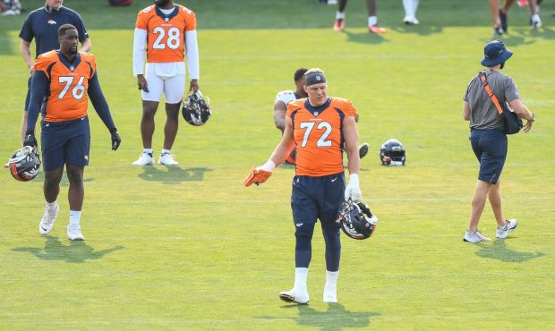 Offensive tackle Garett Bolles #72 of the Denver Broncos stands on the field during a training sess...