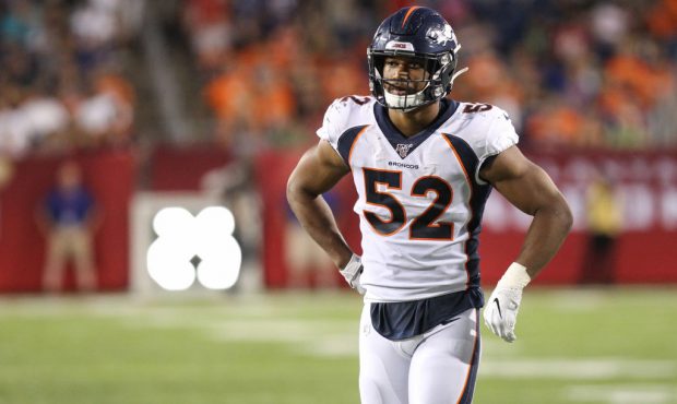 Denver Broncos linebacker Justin Hollins (52) looks to the sideline during the Hall of Fame Game be...