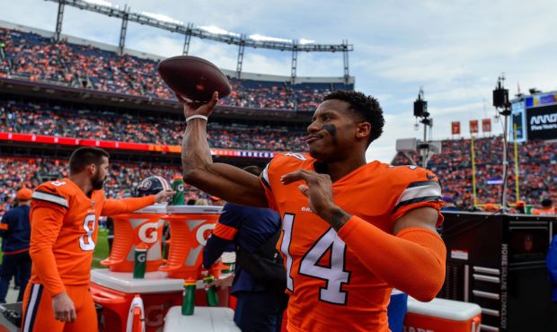 DENVER, CO - DECEMBER 22:  Courtland Sutton #14 of the Denver Broncos throws the ball as he warms u...