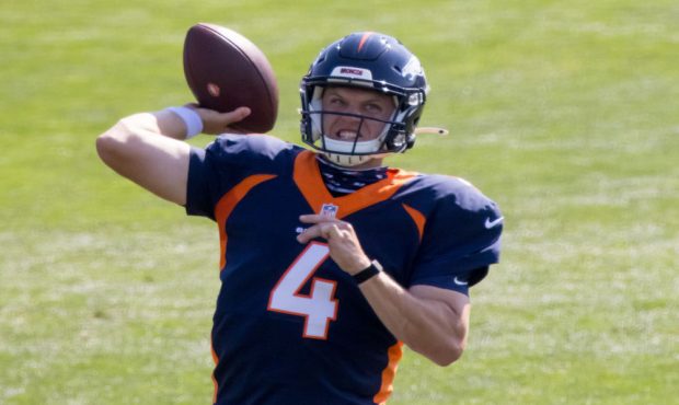 ENGLEWOOD, CO - AUGUST 17:  Quarterback Brett Rypien #4 of the Denver Broncos throws a pass during ...