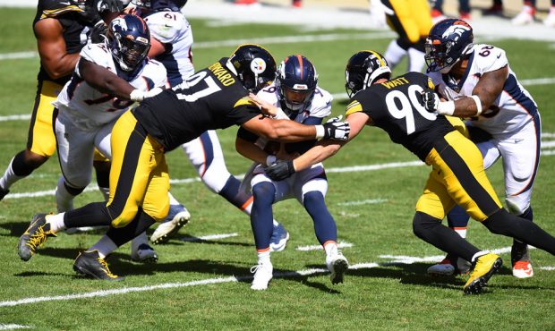 PITTSBURGH, PA - SEPTEMBER 20:  Jeff Driskel #9 of the Denver Broncos is sacked by Cameron Heyward ...
